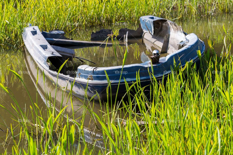 Abandoned flooded boat