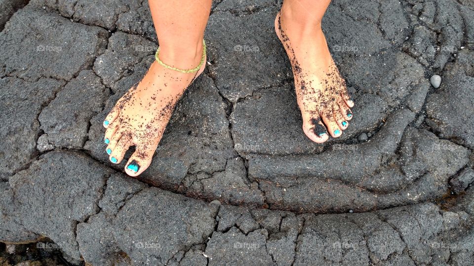 Feet at Black Sands Beach, Punalu'u Beach, Hawaii