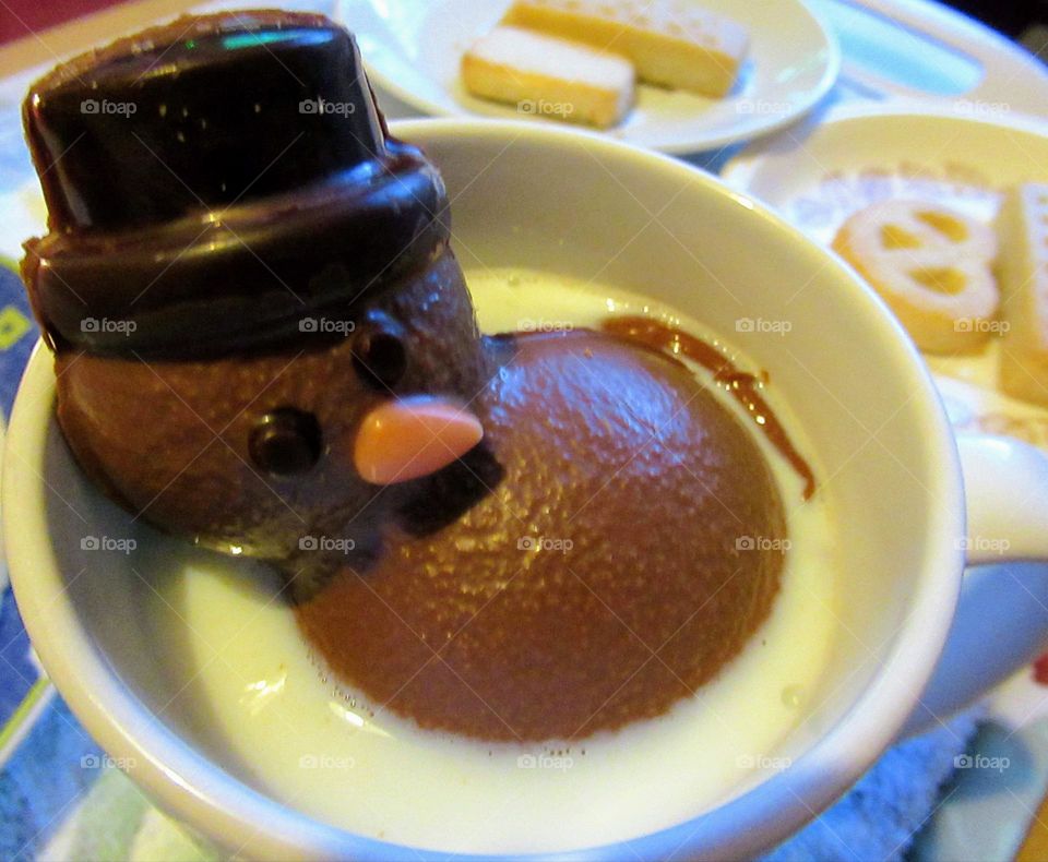 chocolate snowman melting in hot milk with shortbread biscuits ☃️ 🍫