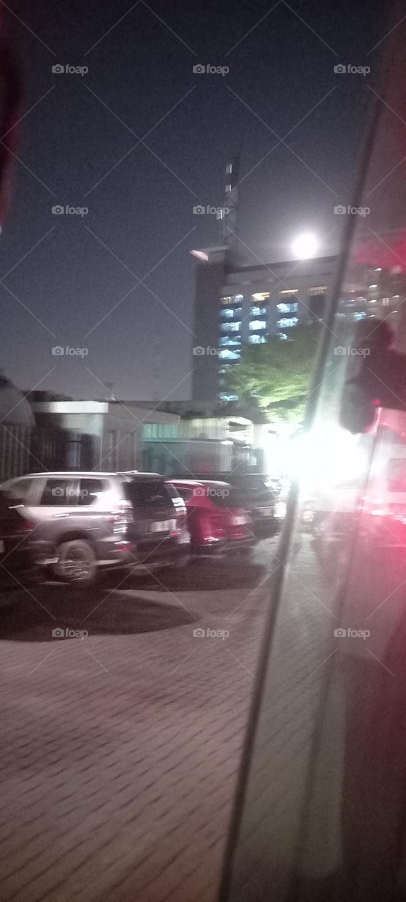 Twinkling windows , the beauty of evening light. Bask in the beauty of evening light with the view of light twinkling from these windows at night