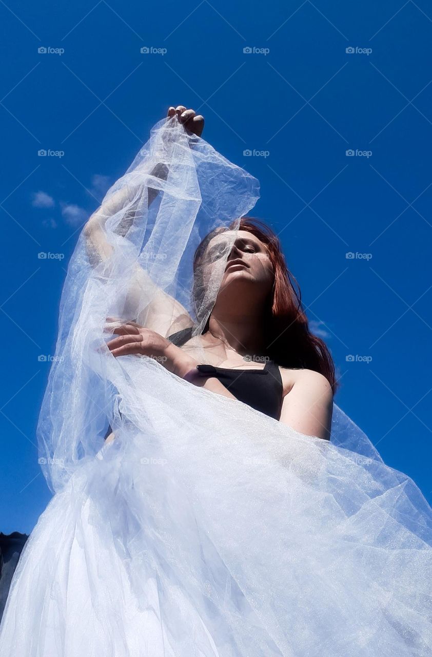 photo of a girl who enjoys the harmony of the air and her own body