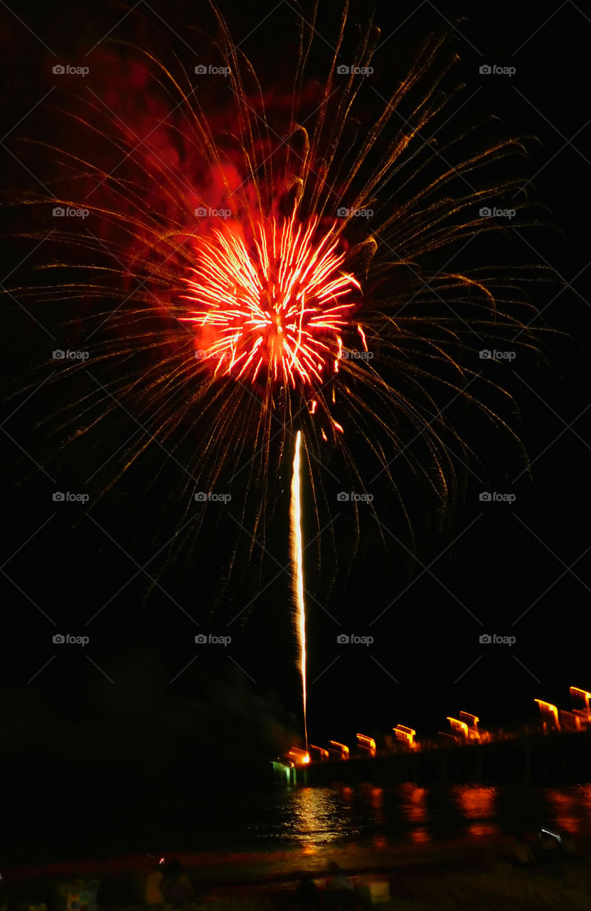 Here, over the Gulf of Mexico, a barrage of missiles designed to explode in a controlled way explode with brilliant red, orange, yellow, green, blue and purple colors! Thousands of people across the United States will be celebrating Independence Day on July 4th by  attending firework displays! 