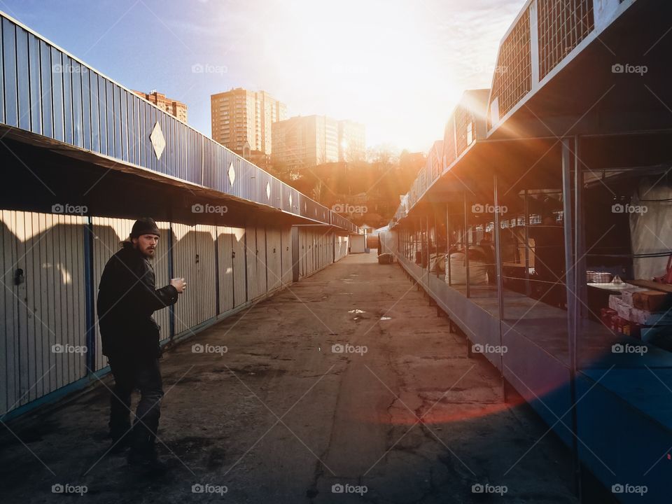 Rear view of a man standing street