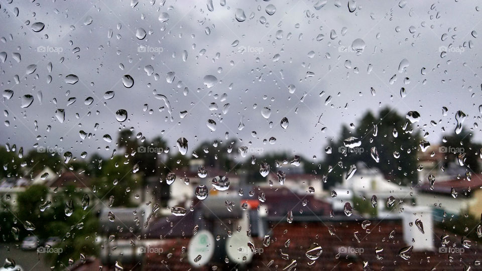 Background of rain drops on window close up.