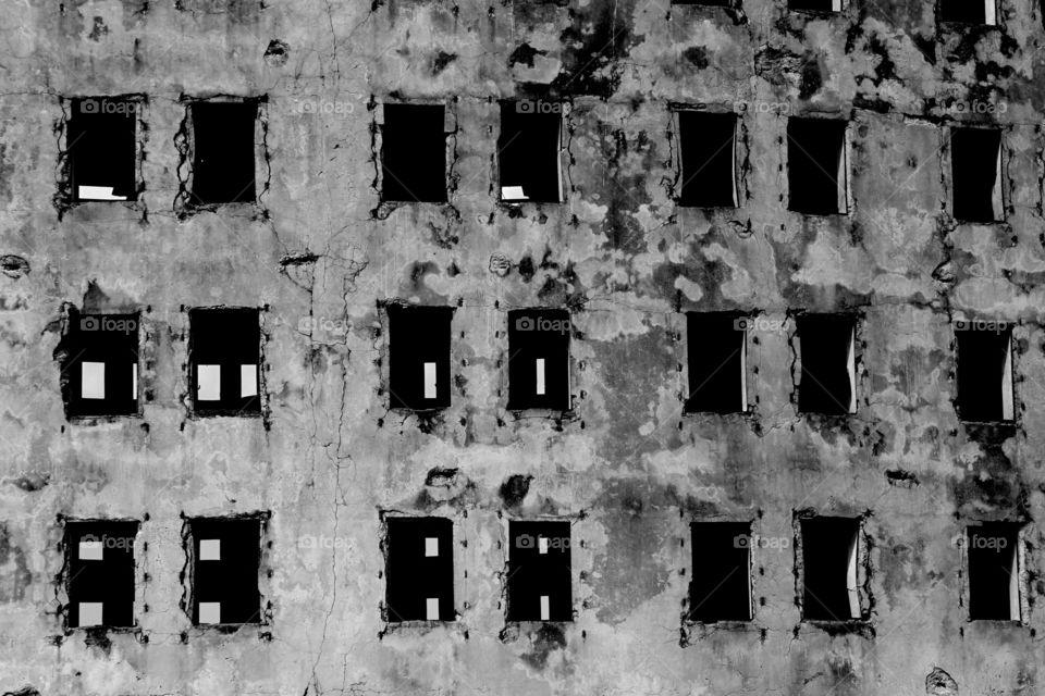 Empty windows. Part of an abandoned prison in Cuba 
