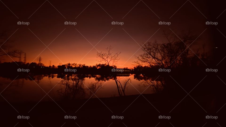 Night is near. Peaceful illuminating backlit colours Twilight hanging on as long as possible. 