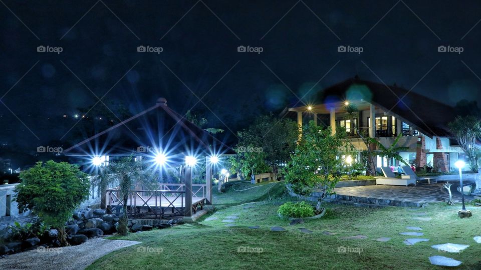 spooky house with orbs surrounding it