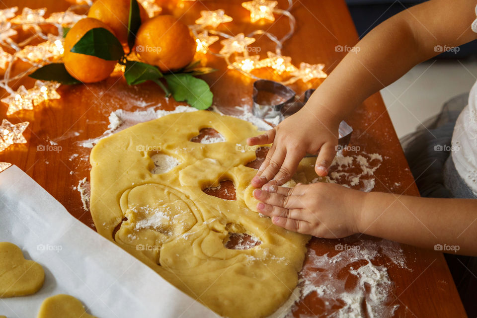 Children cooking ginger cookies 