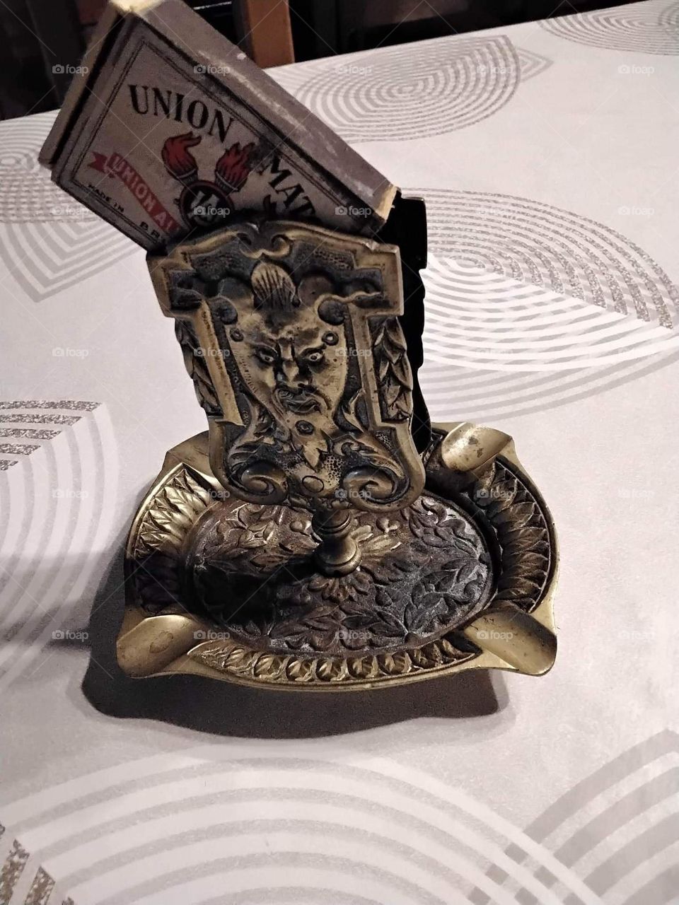 ashtray , match holder , smoking