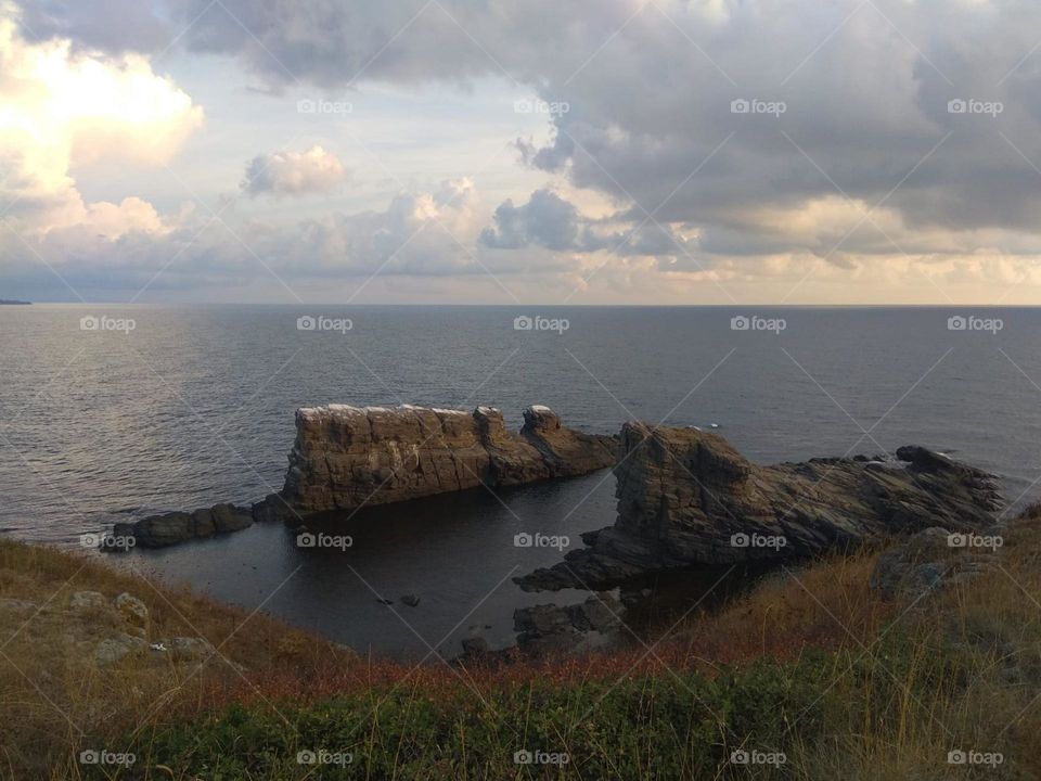 Sea rocks with white tops in the morning