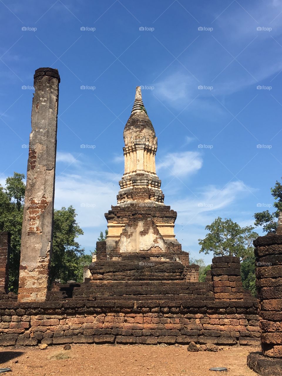 Wat chedi seven rows temple in Sukhothai, Thailand 
