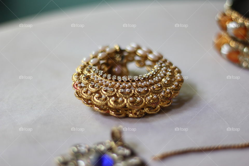 Close-up of golden bracelet
