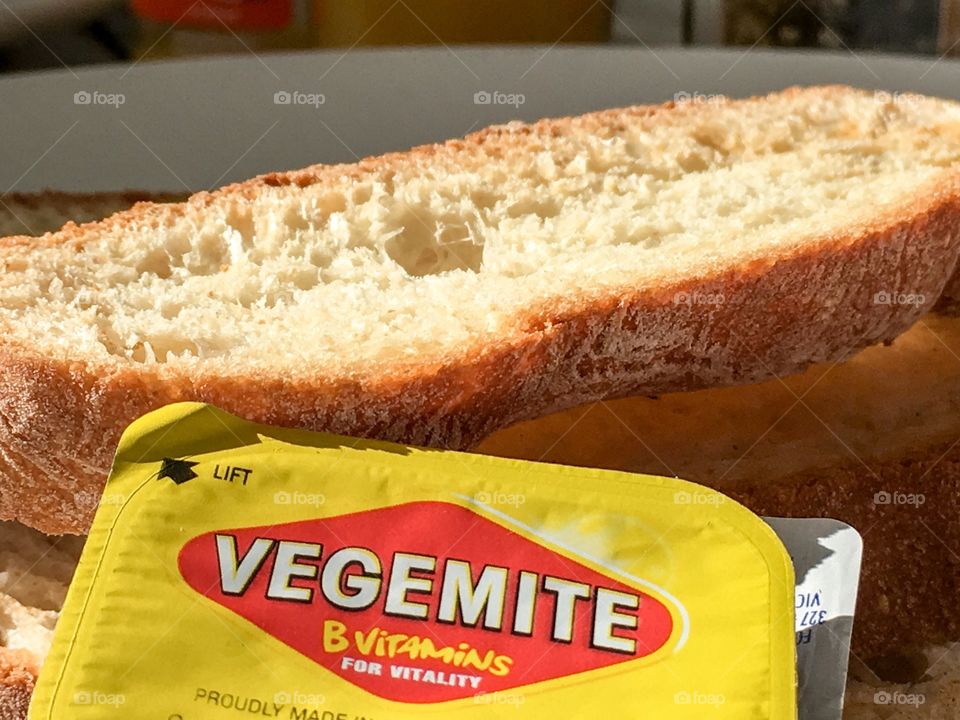 Home baked toasted bread with vegemite spread 