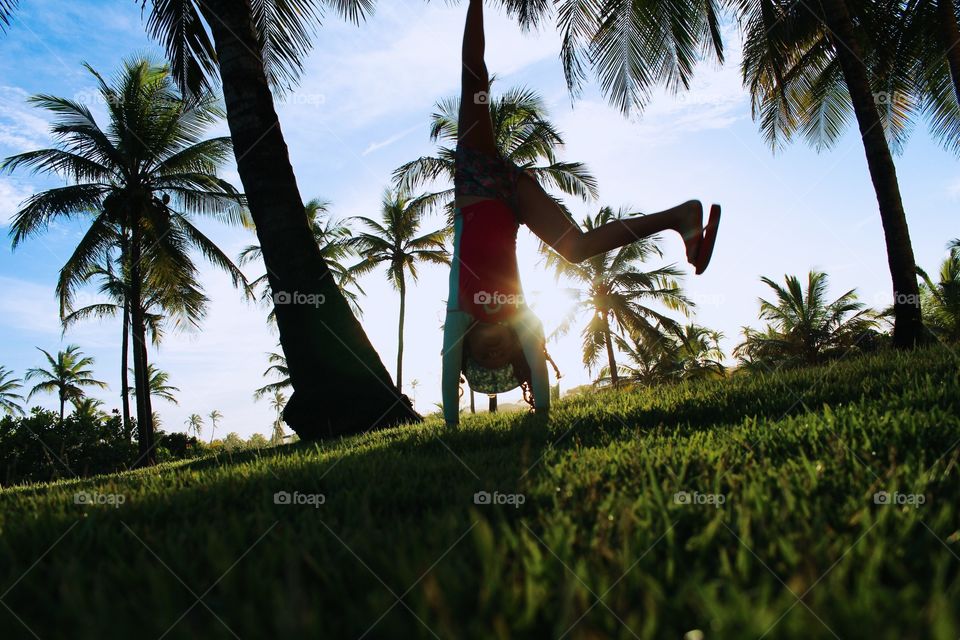 child having fun at the sun harbor in Brazil