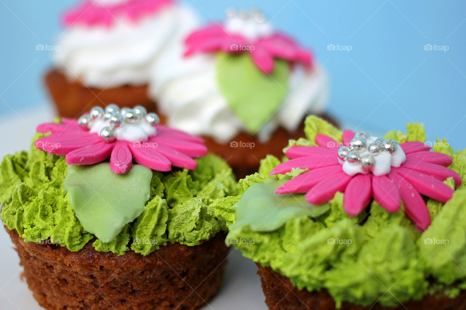 Crazy cupcakes, muffins, a cupcake, a bright cupcake, a cupcake with cream, Cake, sweetness, dessert, cream, bright cake, sugar, delicious cake, flower, cake with flower, color, Fruitcake