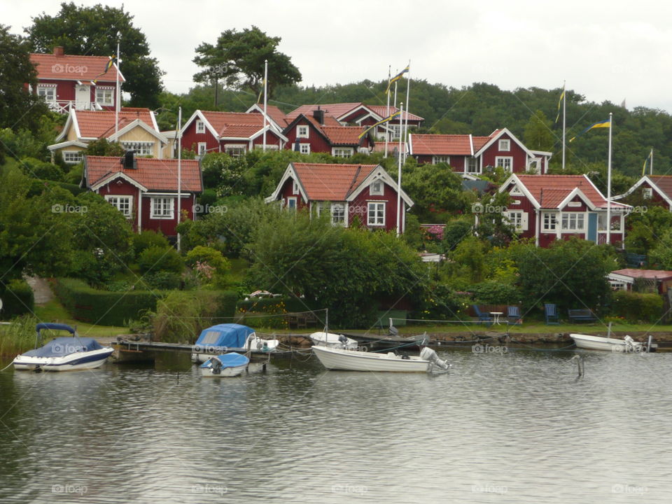 Red summerhouses on a island in Sweden 