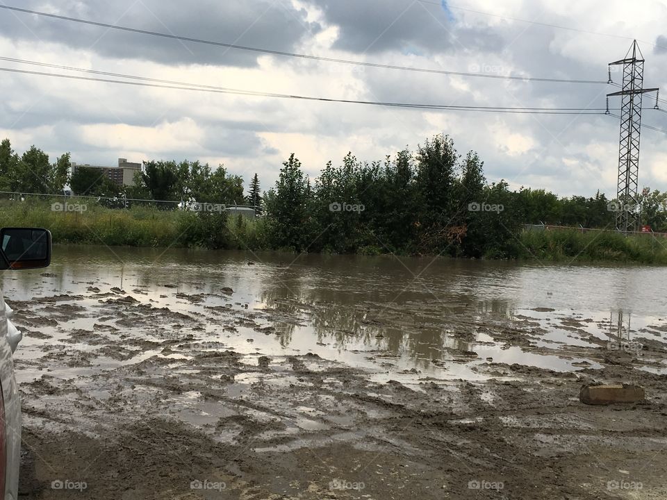 calgary stampede parking lot flooded