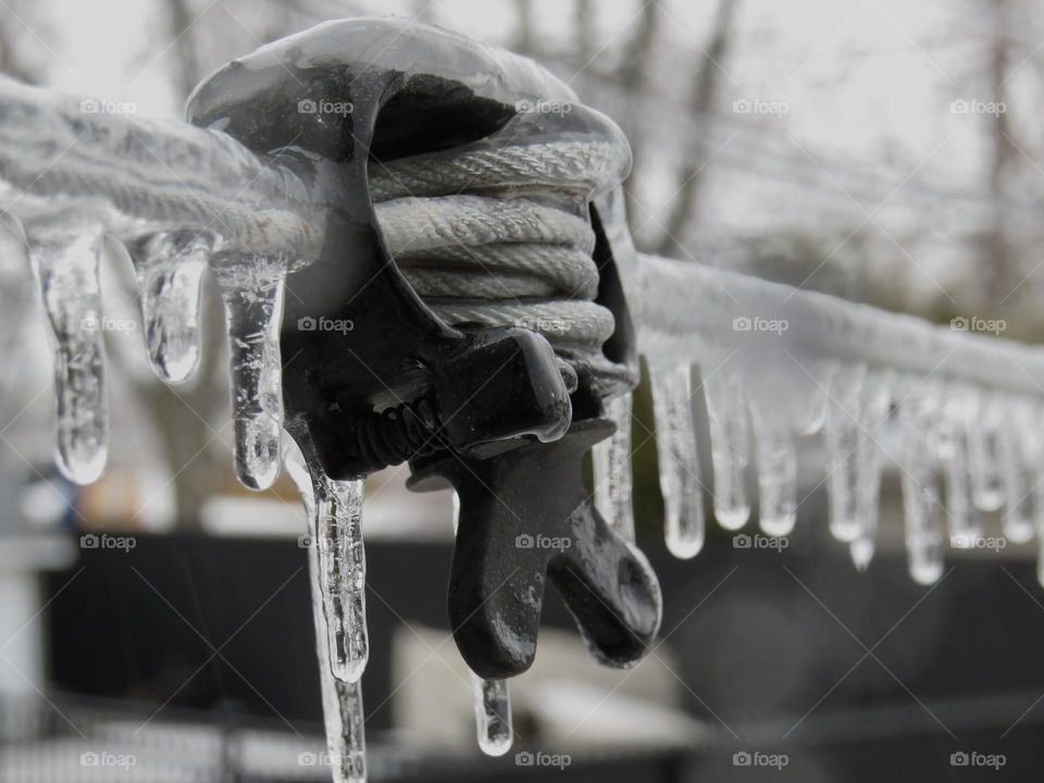 Clothesline tensioner under the ice...