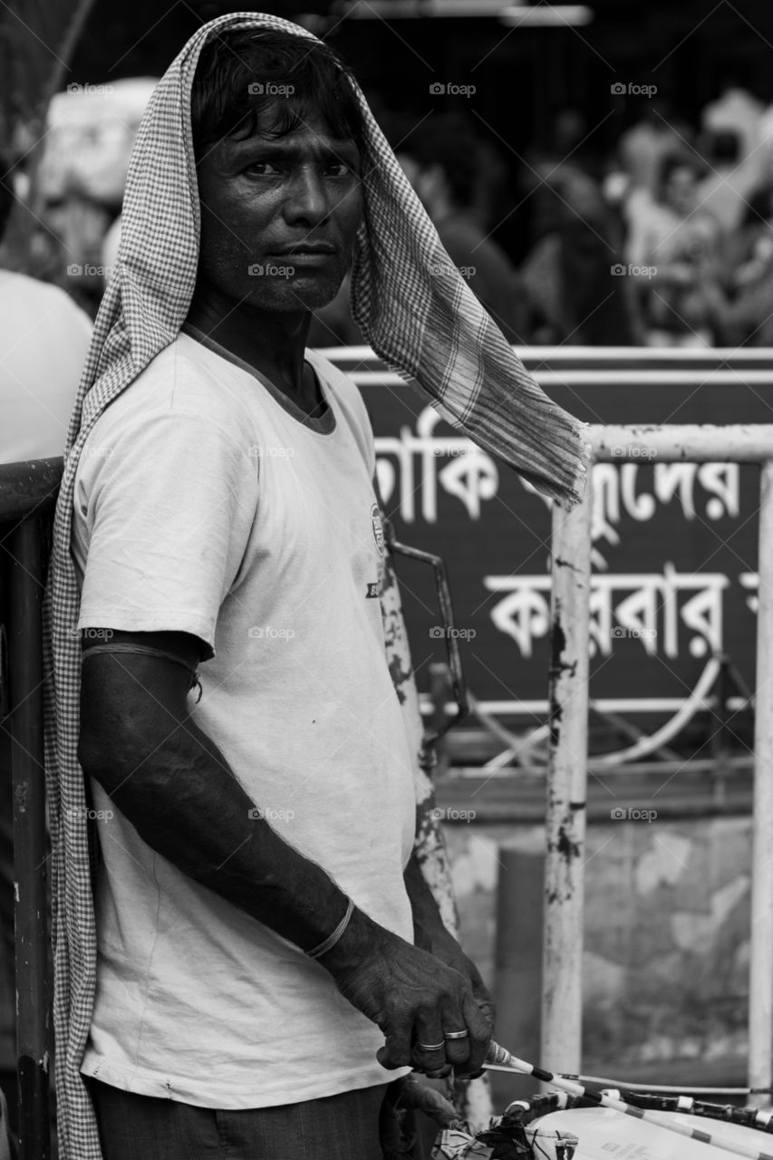 Dhakis (Bengali: ঢাকি) are traditional drummers who play the dhak (drum) during Hindu festivals, primarily in Bengal. Drum beats are an integral part of the five-day-long annual festivities associated with Durga Puja.