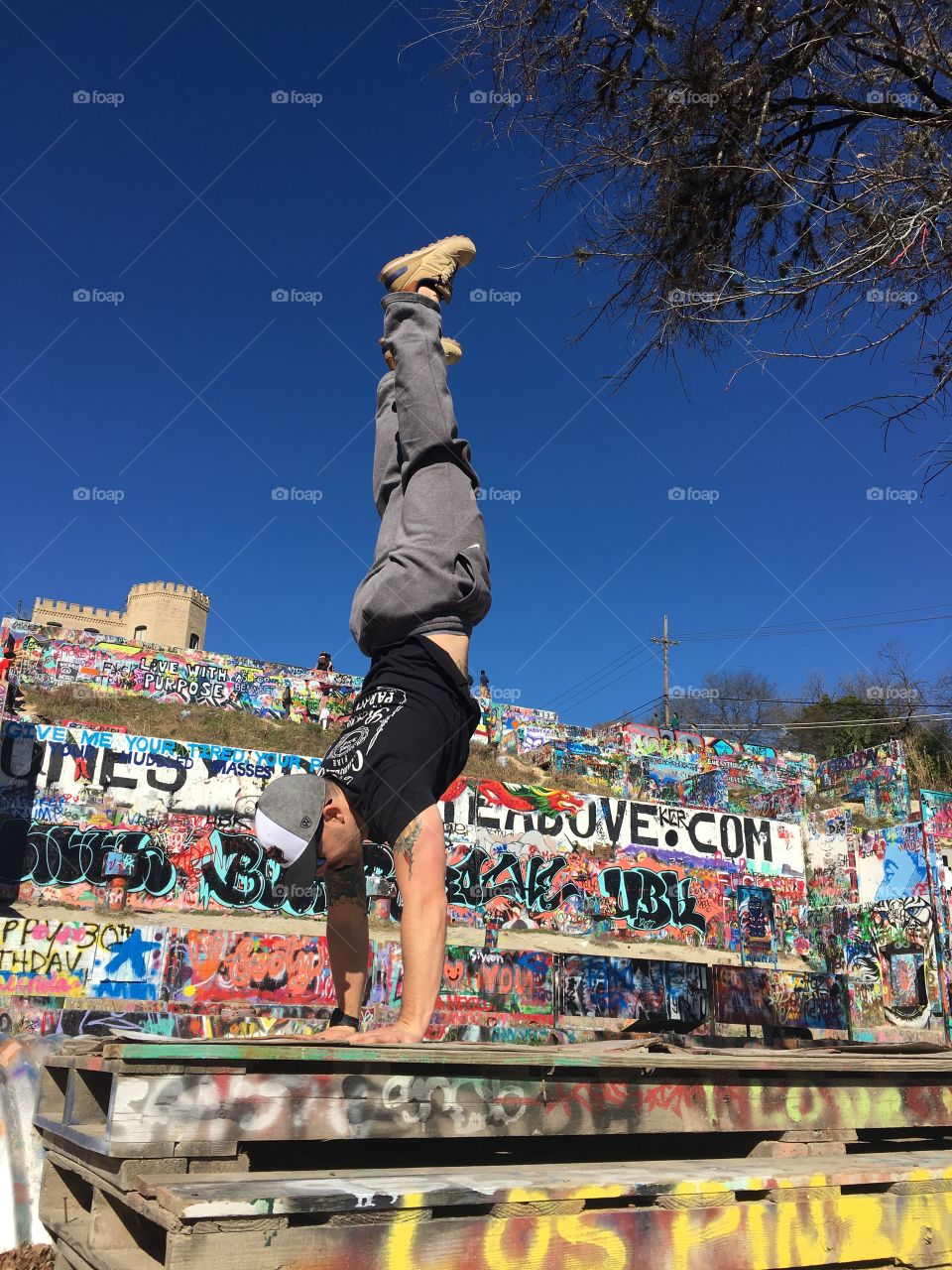 Man doing handstand at Graffiti Park, Austin, Texas