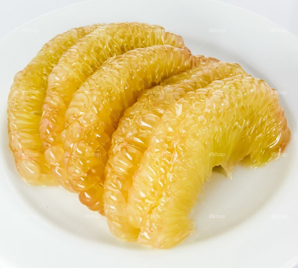 Grapefruit slice . Grapefruit slice in plate