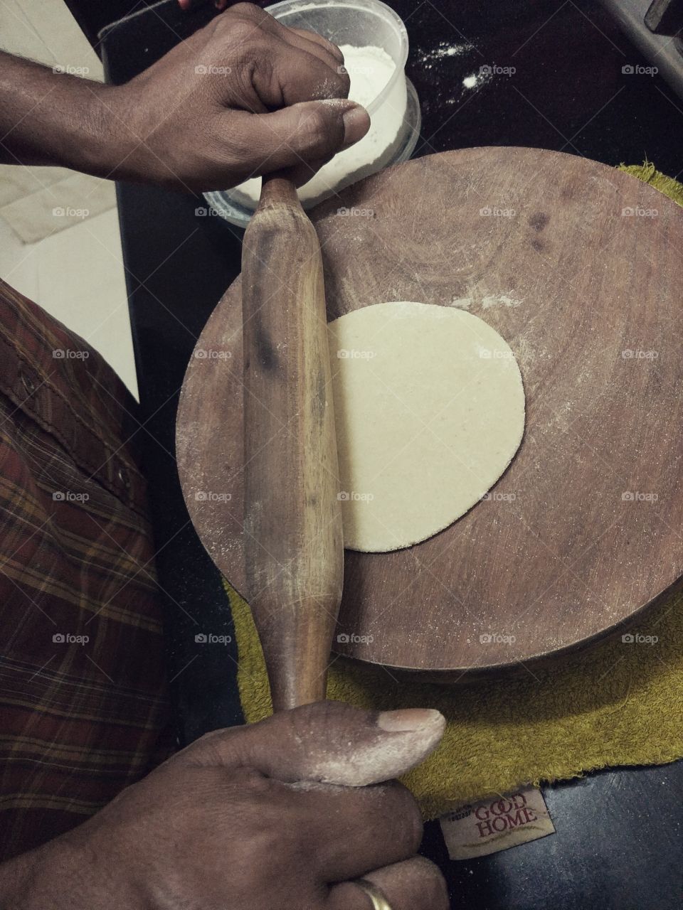 man making breads by hand