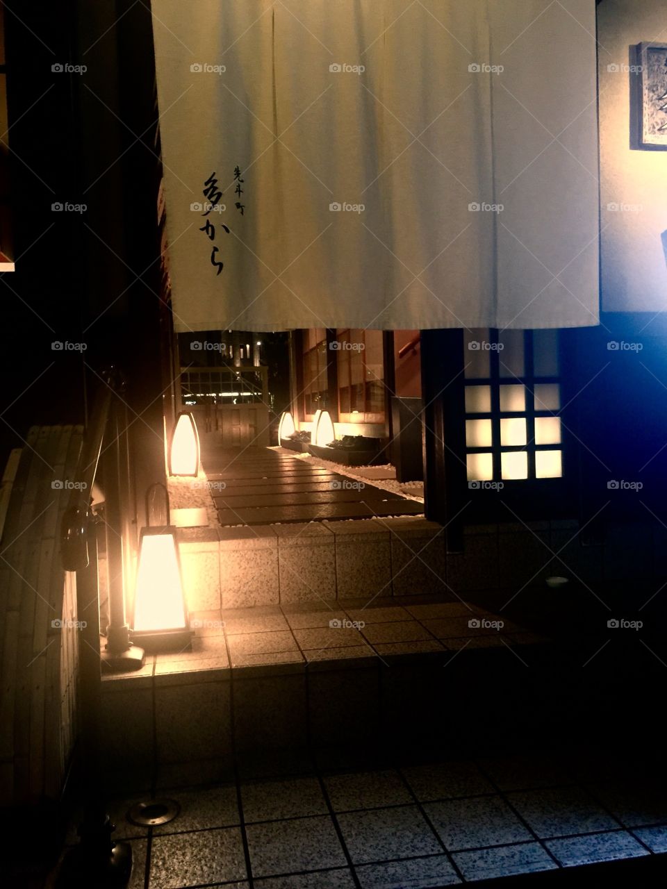 At night, Kyoto's Pontocho Alley lights up to create a magical atmosphere for taking an evening stroll and enjoying food and drinks at local Izakaya restaurants overlooking the river.