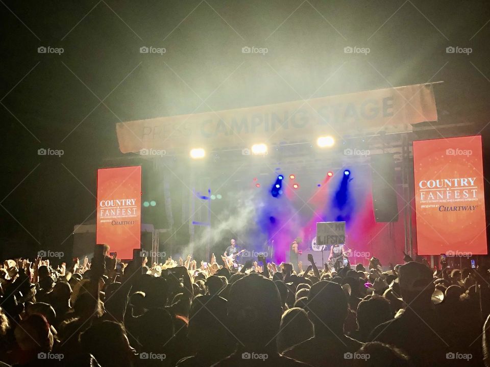 A lively latenight crowd enjoying the “after party” show at Country FanFest in Utah 