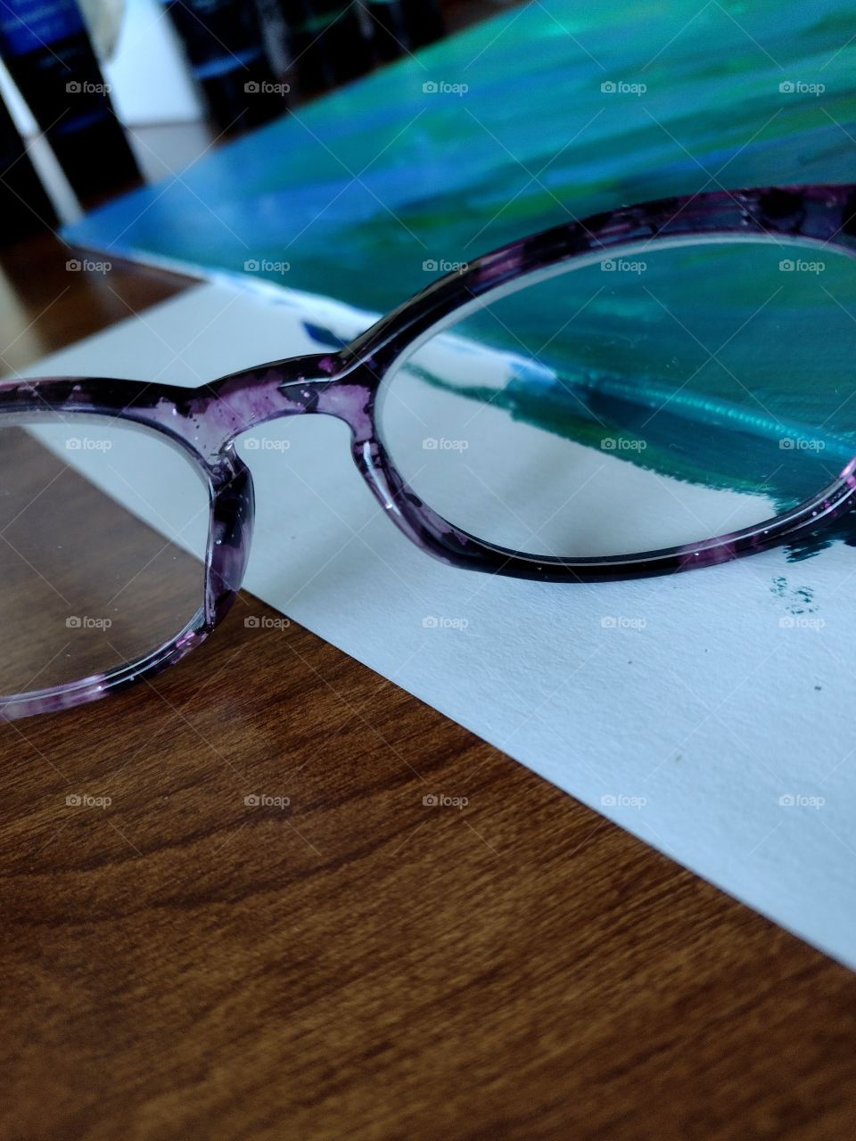Unfiltered, beautiful, lovely close-up of glasses and a painting
