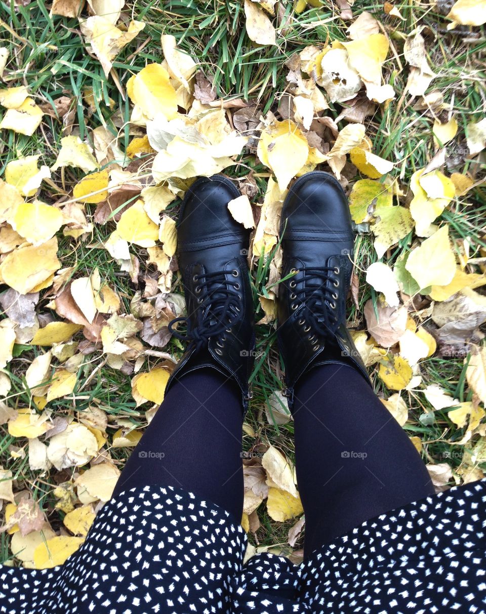 Fall leaves and boots