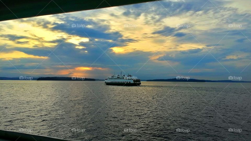 Sunset Ferry. While crossing the Puget Sound in the Pacific Northwest, I watched this ferry pass by as the sun set.