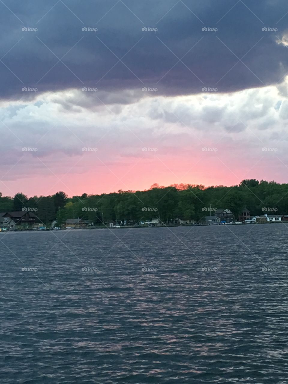 Pink sky over lake