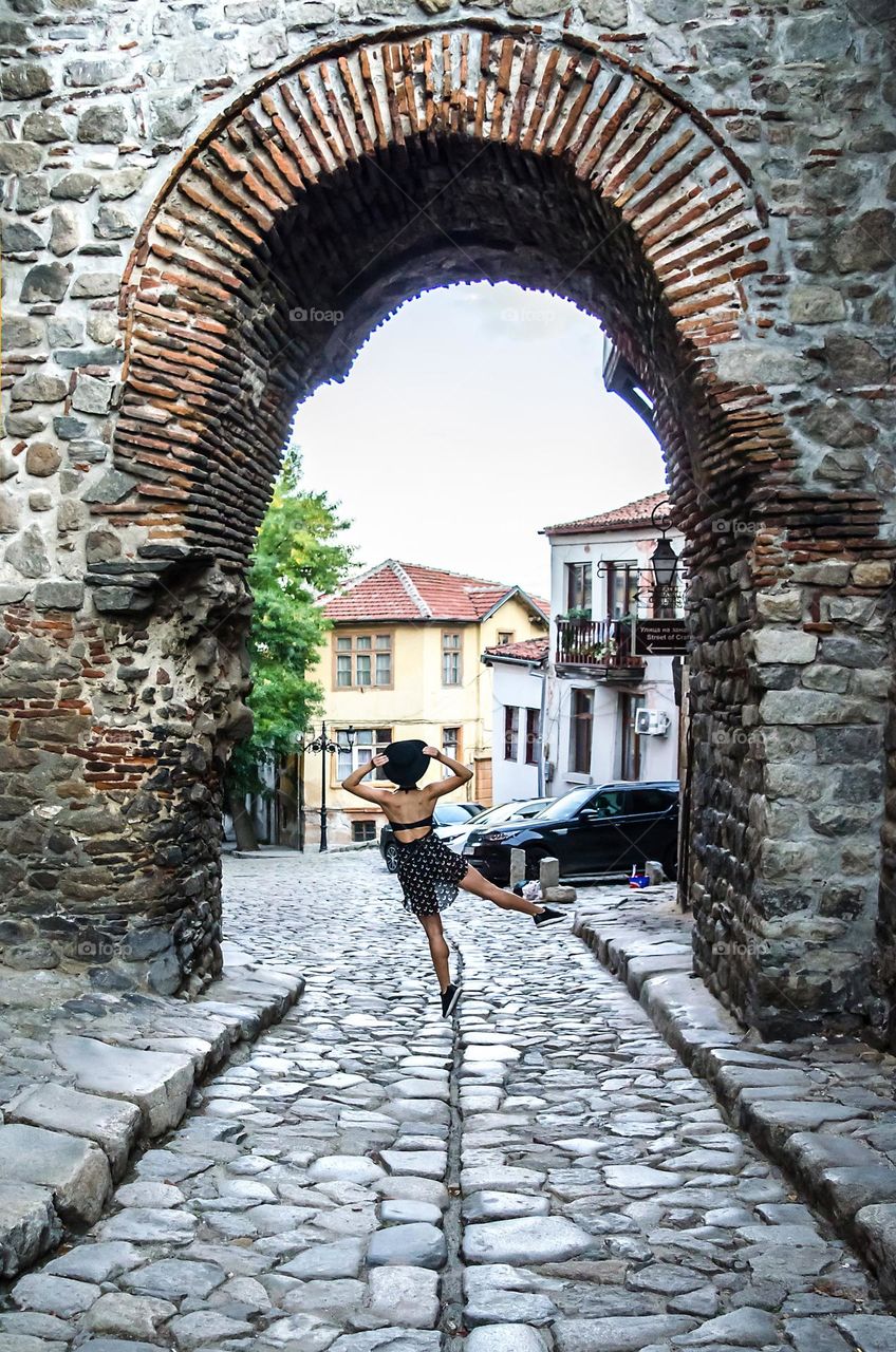 Young Female Ballerina Dancing Outside