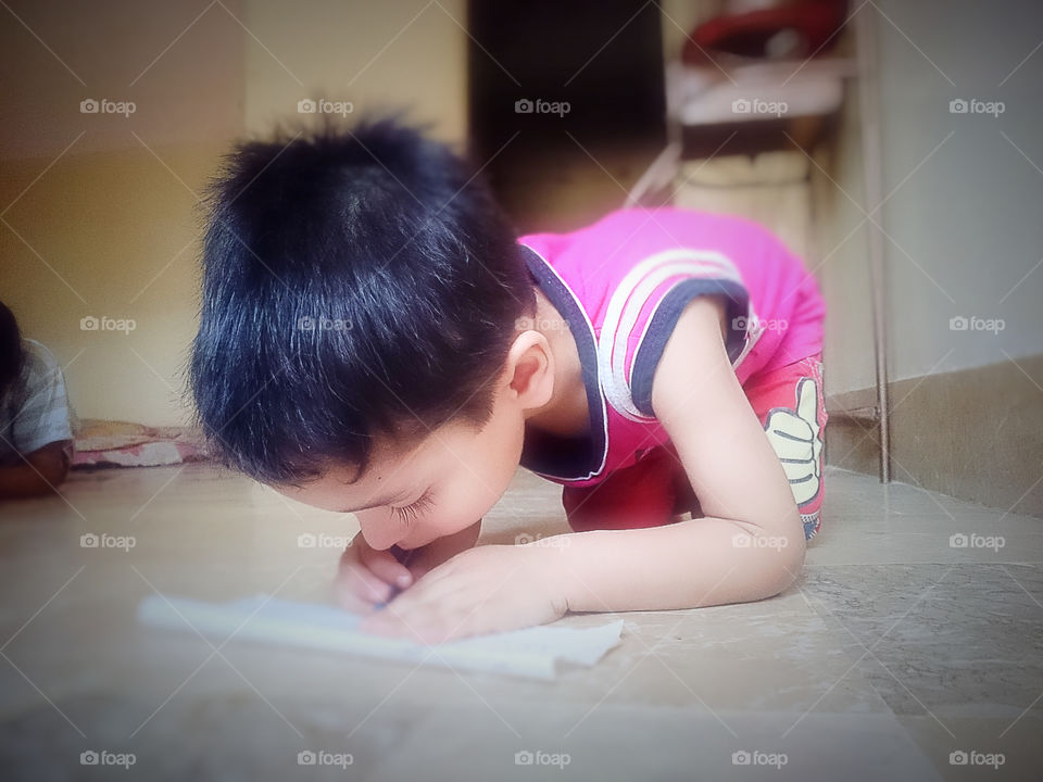 Kid Learning . my nephew writing on paper 😊