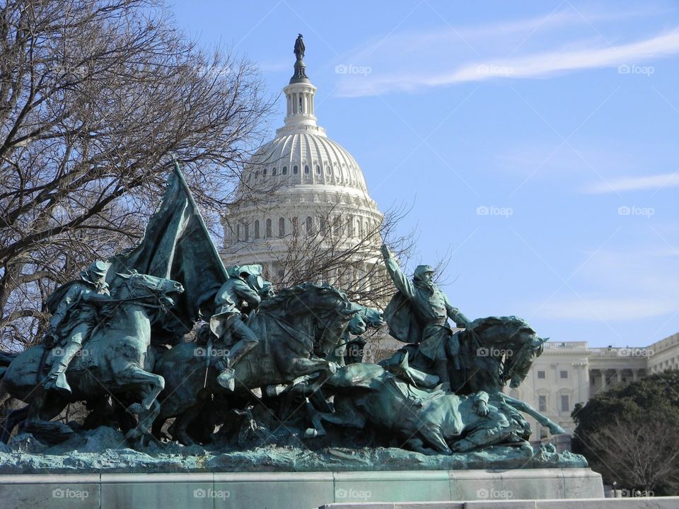 Washington DC Statue and nations Capitol building. 