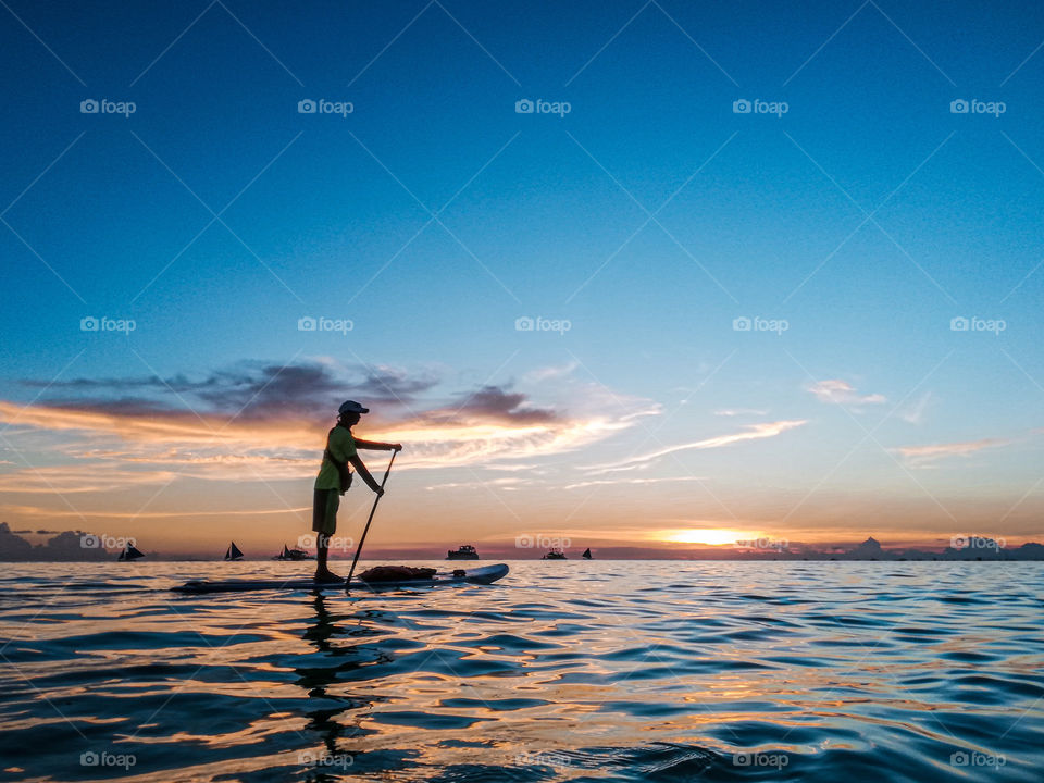 rowing on a calm sea