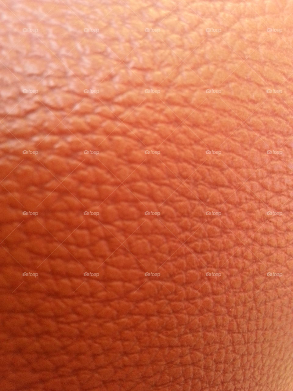 close up the texture of orange leather