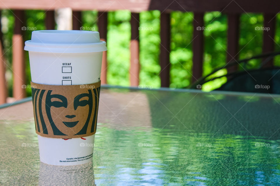 Enjoying the Starbucks on the deck