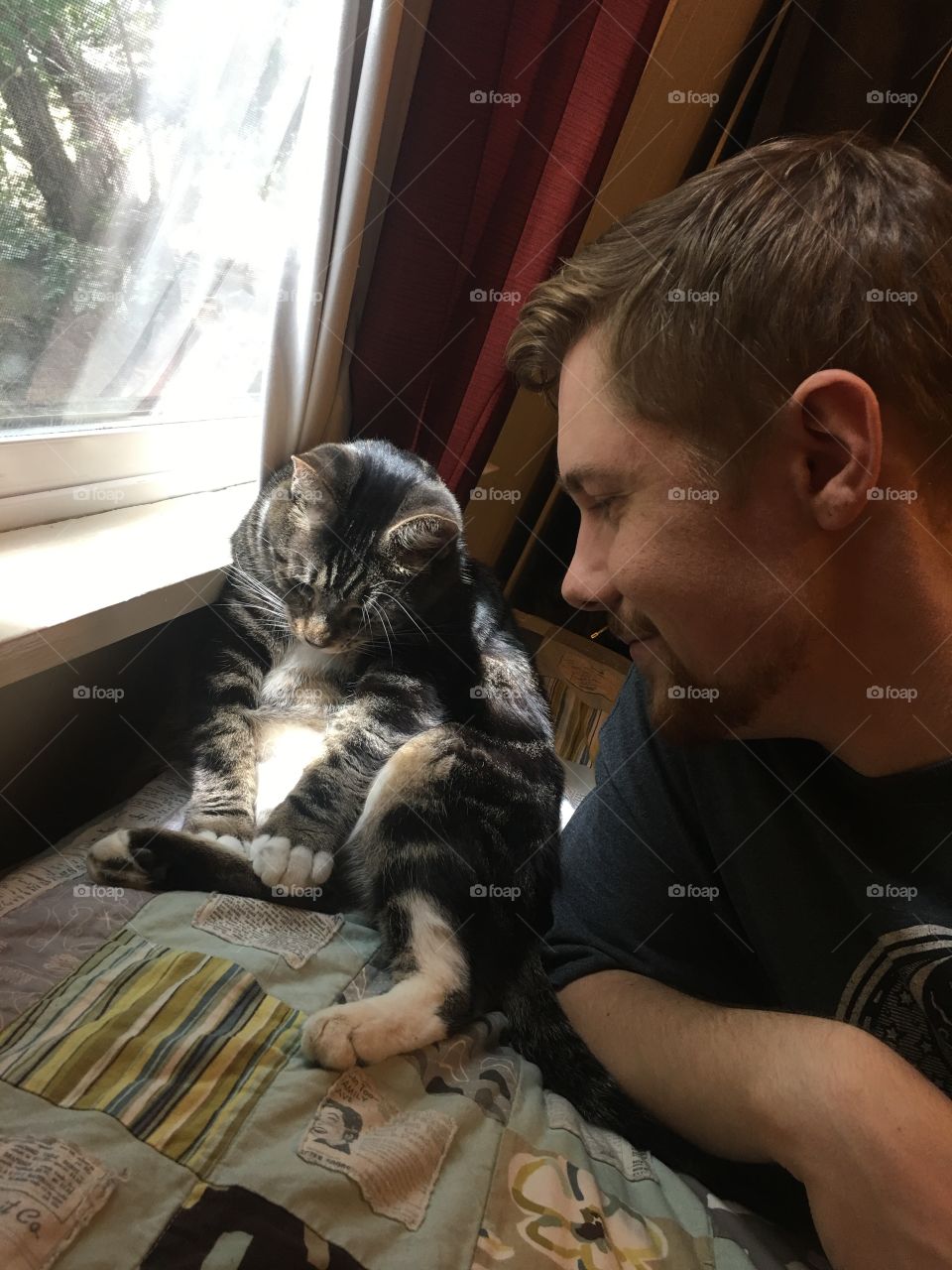 Guy and a cute cat