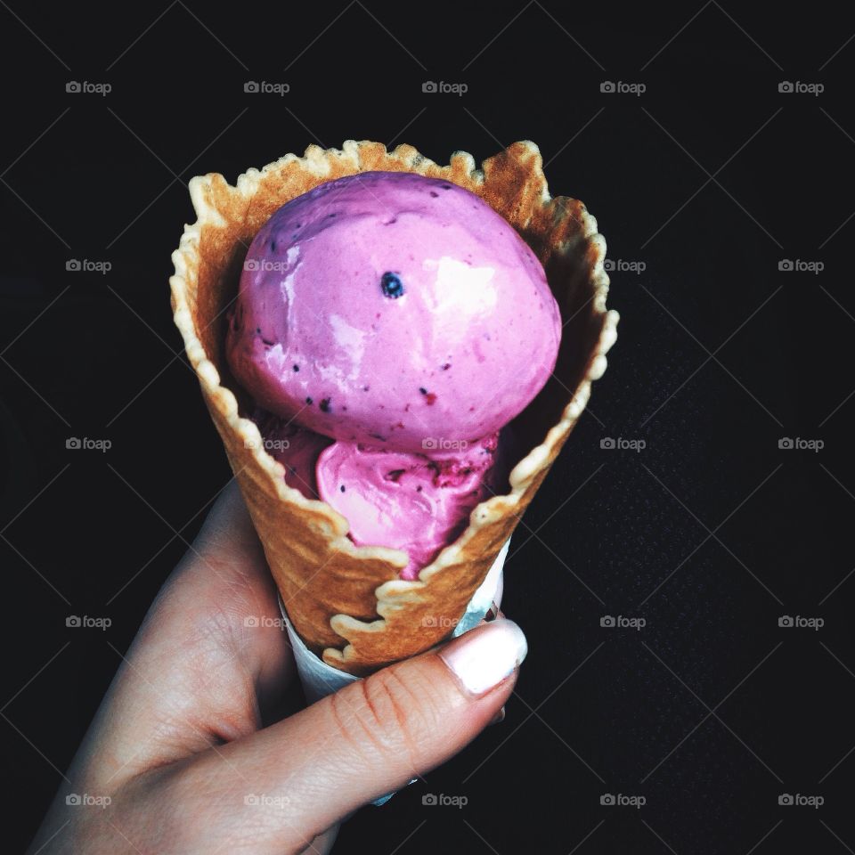 A woman holding ice cream