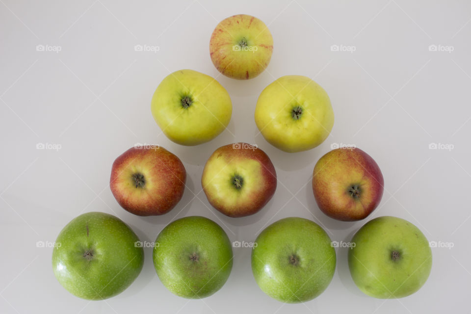 Apple pyramid in different colors 