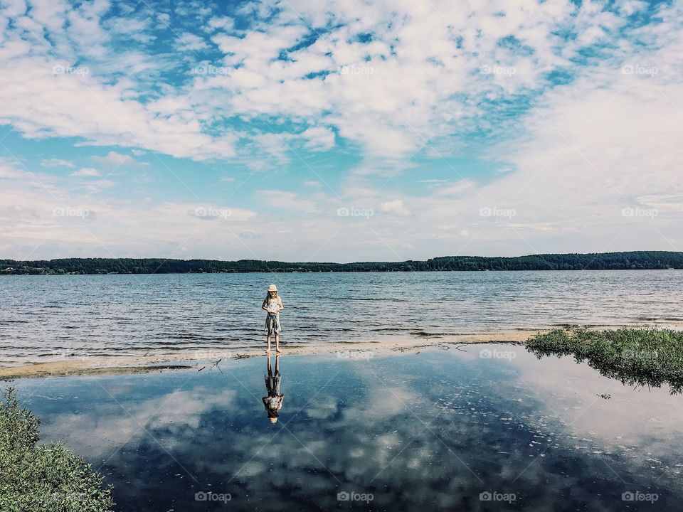 Girl's reflection in water