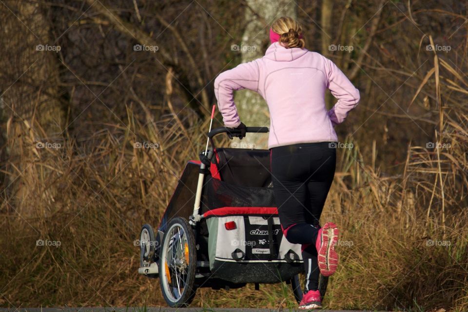 Woman Jogging With Buggy