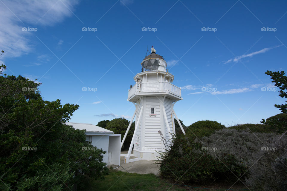 White wooden lighthouse