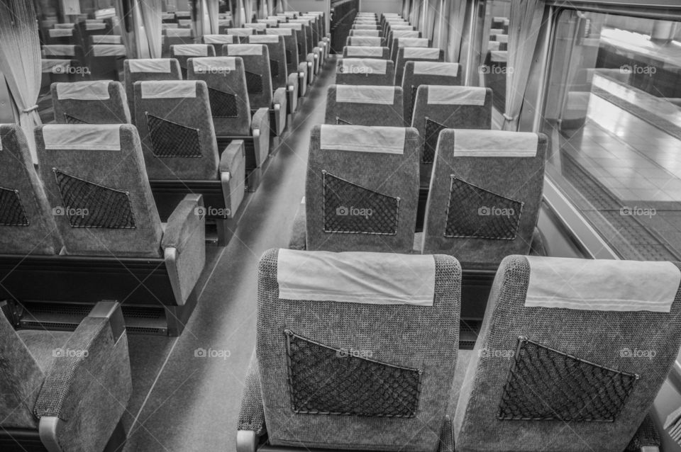 Black And White Photo Of A Train Inside