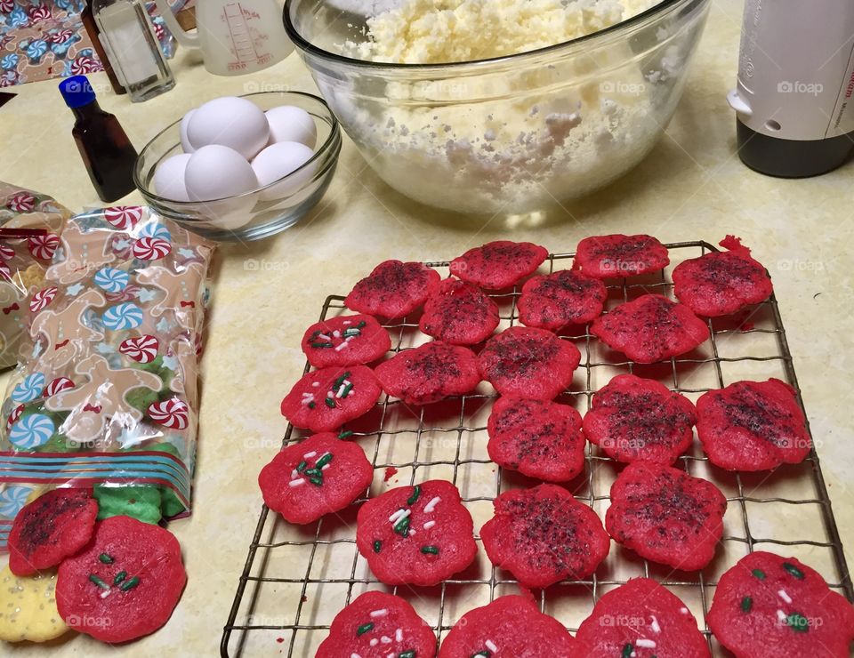 Making red holiday cookies 