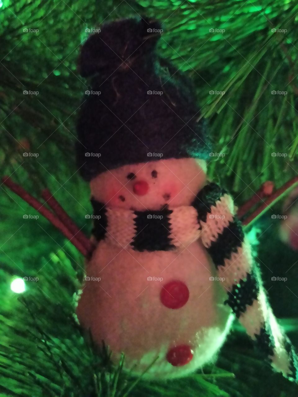 Christmas toys on the tree.