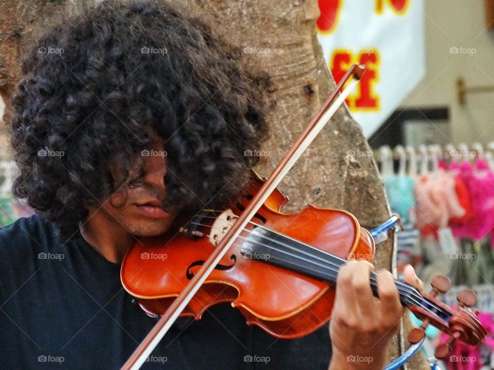 Playing The Violin. Street Musician In Mexico Playing The Violin

