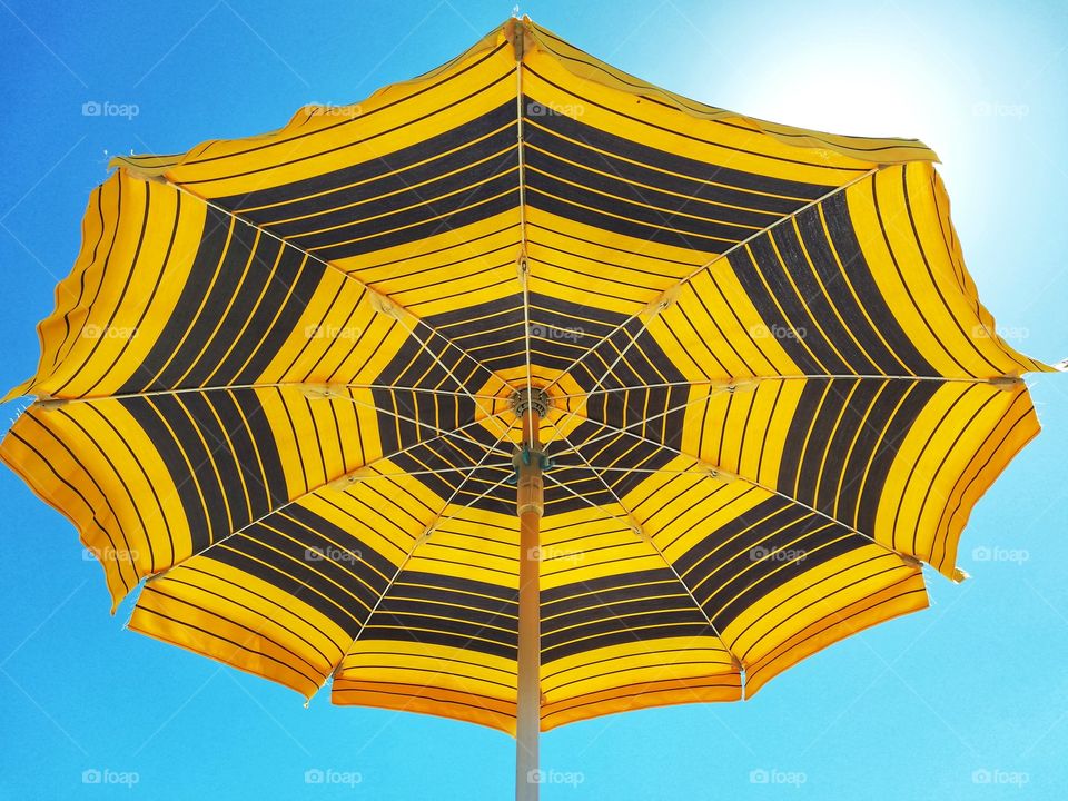 Beach umbrella and blue sky