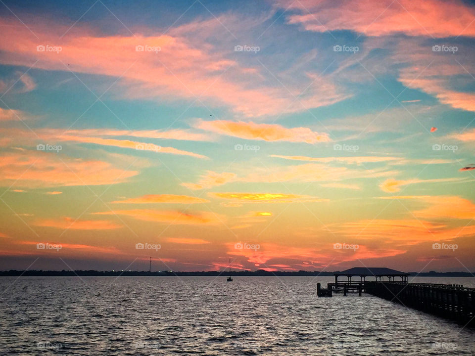 View of calm sea during sunset